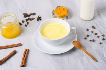 moon milk with turmeric honey and spices, top view