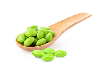green soybeans in wood spoon isolated on white