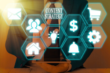 Writing note showing Content Strategy. Business concept for important Marketing approach...
