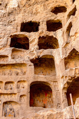 It's Longmen Grottoes ( Dragon's Gate Grottoes) or Longmen Caves.UNESCO World Heritage of tens of thousands of statues of Buddha and his disciples
