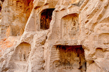 It's Longmen Grottoes ( Dragon's Gate Grottoes) or Longmen Caves.UNESCO World Heritage of tens of thousands of statues of Buddha and his disciples