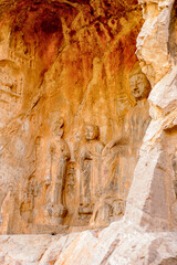 It's Longmen Grottoes ( Dragon's Gate Grottoes) or Longmen Caves.UNESCO World Heritage of tens of thousands of statues of Buddha and his disciples