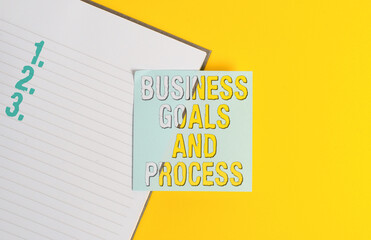 Conceptual hand writing showing Business Goals And Process. Concept meaning company planning and...