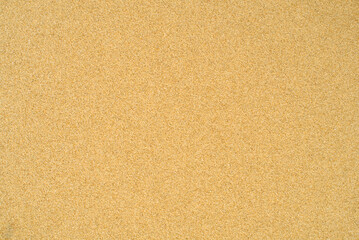 Fototapeta premium Fine clean beach sand, seamless texture background wallpaper, Natural concept design, summer sunset mood 
