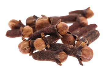 Cloves spice. Some dried cloves, macro close-up Isolated on white background, with a light shadow.