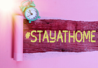 Text sign showing Hashtag Stay at home. Business photo showcasing a trending label in social media...