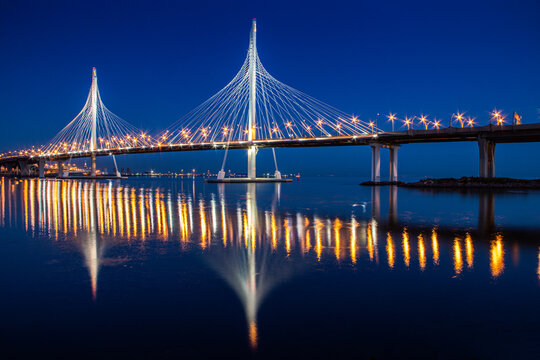ZSD bridge at night. Night landscape of the city of Saint Petersburg. Modern bridge over the river. . Sights Of Saint Petersburg. Night city. Road bridge .