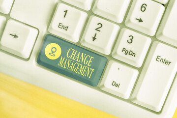 Writing note showing Change Management. Business concept for development within a business or...