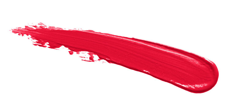 Lipstick smudge stroke swatch isolated on white. Red pink color lip makeup product smear close up