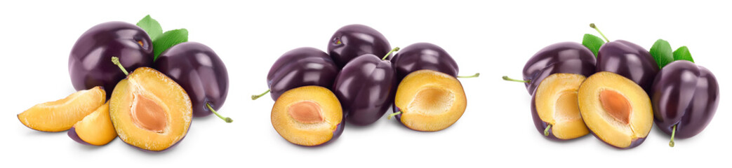 fresh purple plum and slices with leaves isolated on white background with clipping path and full...