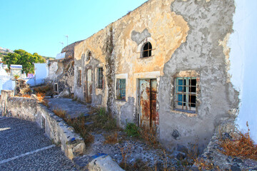 Old derelict houses in the village of  Vothanos in central Santorini, Greece.