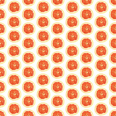 Seamless infinity pattern of isolated slices of grapefruit. Wallpaper for background, design and packaging.