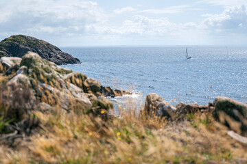 Fototapeta na wymiar Wild rocky coast on Kullen peninsula in western Sweden, Skane