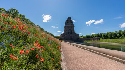 Red poppy flowers at the Monument to the Battle of the Nations in Leipzig
