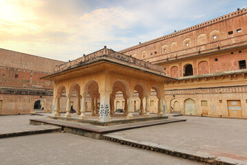 Fototapeta na wymiar Amber Fort medieval royal palace architecture ruins at Jaipur, Rajasthan, India. Amer Fort is a UNESCO World Heritage site and popular tourist destination