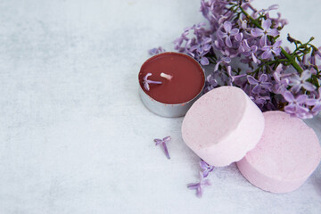 Concept of Spa-cosmetic and cosmetic procedures. Bath salt in effervescent tablets with lilac...