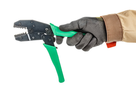 Electrician hand in black protective glove and brown uniform holding crimping tool for mounting BNC connectors isolated on white background - Powered by Adobe