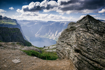 panorama of the fjord in Norway. view of the fjord. Two rocks over a cliff. Mountain lake and stone cliffs. Norwegian view from the mountain