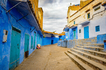 Fototapeta na wymiar It's Blue walls of the houses of Chefchaouen, Morocco.