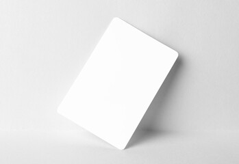 Photo of mockup business card on white background. Template for branding identity and company name.