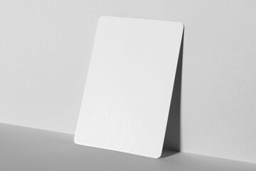 Photo of mockup business card on white background. Template for branding identity and company name.