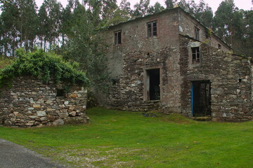 Fototapeta na wymiar Old stone houses in a village at Mirador de Muronovo in Asturias,Spain,Europe 