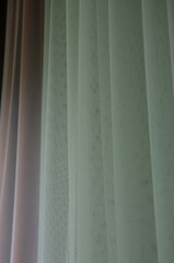 Wavy transparent curtains texture closeup background.