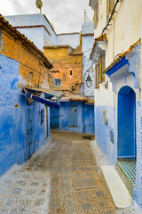 It's Blue wall of Chefchaouen, small town in northwest Morocco famous by its blue buildings