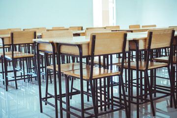 Lecture school empty classroom with desks chair iron wood when student close stay at home in high school