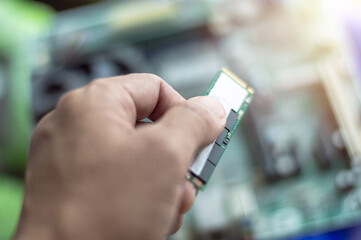 m2 ssd drive on man hand