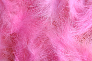 Pink boa background of purple feathers in art deco retro burlesque carnival