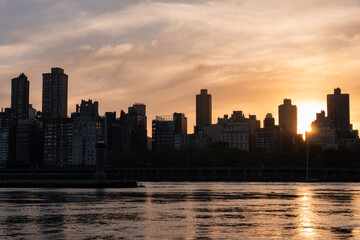 Beautiful Sunset over the Roosevelt Island and Upper East Side Skyline along the East River in New York City