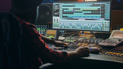 Music Creator, Musician, Artist Works in the Music Record Studio, Uses Surface Control Desk...