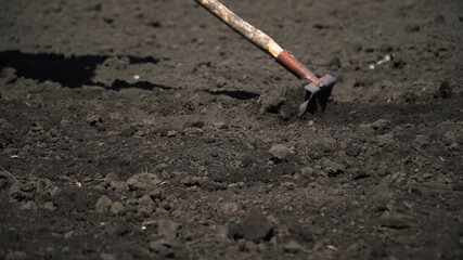 Land cultivation with hand tools