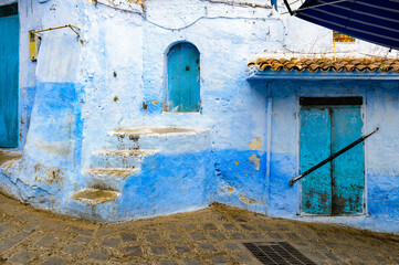 It's Blue painted walls of the houses in Chefchaouen, small town in northwest Morocco famous by its blue buildings