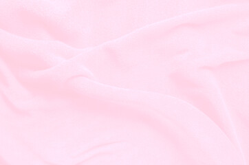 Pink pastel soft cotton towel from natural, texture for background, close up photo.