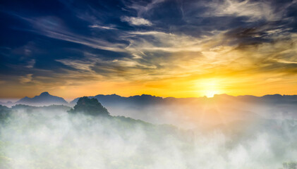 The sunrise sky and the sea of clouds at the top of the mountain