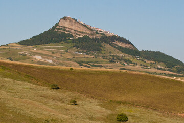 landscape with the village of Cairano and cultivated fields on the hill. Campania, Irpinia, Avellino, Italy