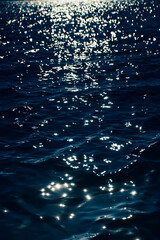 blue sea with glare of the sun
