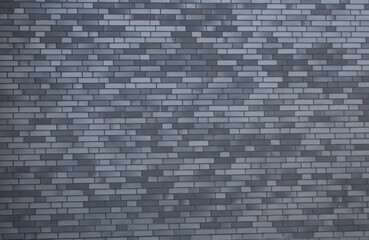 Gray brick wall, gloomy background, black brick wall of dark stone texture, black wallpaper