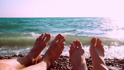 Close up Happy couple dancing feet. On the beach on a summer holiday Summer concept Slow motion - Powered by Adobe