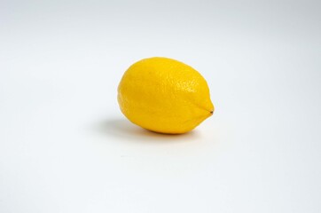 Yellow fresh lemon close up background