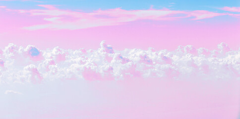 Blue sky and clouds background. View from plane window