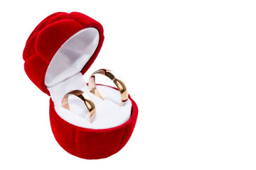 Two gold wedding rings isolated symbolize love, wedding