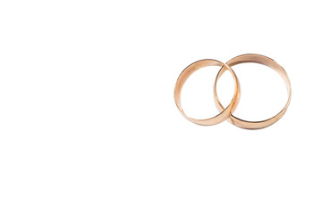 Two gold wedding rings isolated symbolize love, wedding