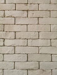 Beige brick wall background stock photo. Beige stone wall image.