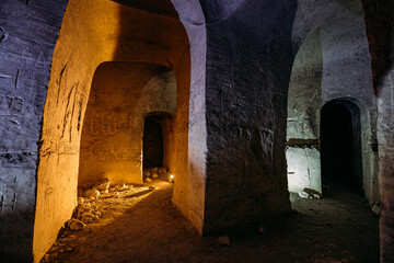 Dark abandoned underground chalky cave temple