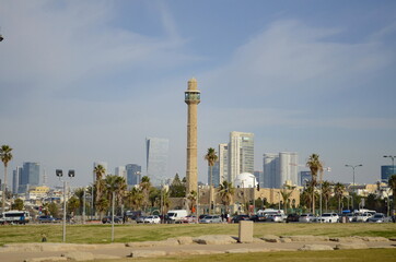 Hassan Bek Mosque. Tel Aviv. Israel. Tower of a mosque in a modern city among skyscrapers and palm...