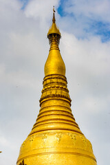 Fototapeta premium It's Surroundings of the Shwedagon Pagoda, a gilded stupa on the Singuttara Hill, Kandawgyi Lake, Yangon, Myanmar