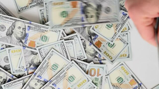 Us dollars with nominal of 100, slow motion close up